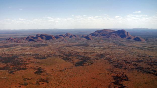 The 36 granite and basalt conglomerate domes of Kata Tjuta (Credit: Credit: Torseten Blackwood/AFP/Getty Images) The 36 granite and basalt conglomerate domes of Kata Tjuta (Credit: Credit: Torseten Blackwood/AFP/Getty Images)