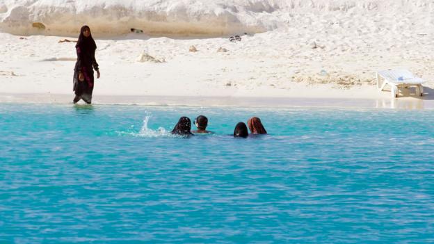 Women bathing at a local beach (Credit: Credit: Diane Selkirk) Women bathing at a local beach (Credit: Credit: Diane Selkirk)