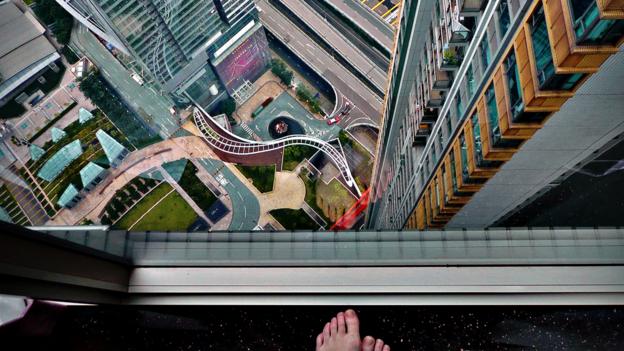 A vertigo-inducing view, found while couch-surfing in Hong Kong (Credit: Credit: Sabrina Iovino) A vertigo-inducing view, found while couch-surfing in Hong Kong (Credit: Credit: Sabrina Iovino)