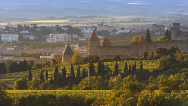 Carcassonne, France, seen over vineyards (Credit: Credit: Ken Welsh/Getty) Carcassonne, France, seen over vineyards (Credit: Credit: Ken Welsh/Getty)