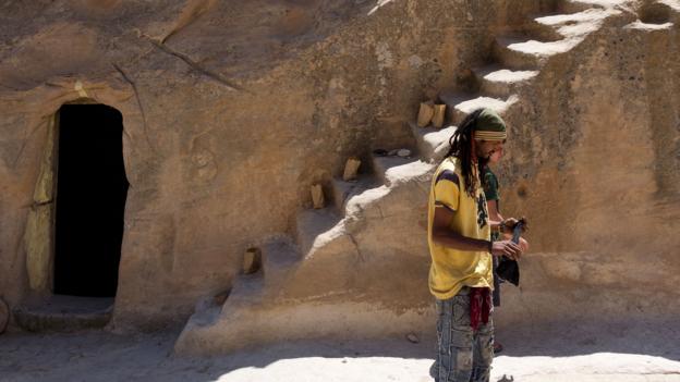 Stone stairs descend to the cave's opening (Credit: Credit: Will Jehring)