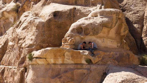 Collecting wood for the night's fire (Credit: Credit: Will Jehring)