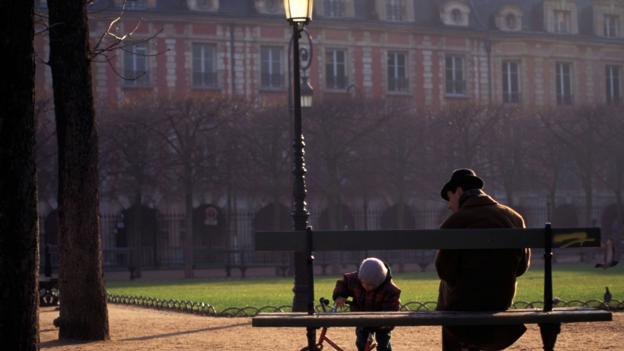 A father and son play in Place des Vosges (Credit: Credit: Jochem Wijnands/Horizons WWP/TRVL/Alamy) A father and son play in Place des Vosges (Credit: Credit: Jochem Wijnands/Horizons WWP/TRVL/Alamy)