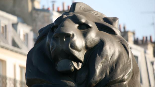 The lion in the Denfert-Rochereau circle (Credit: Credit: Gilles Targat/Photos 12/Alamy) The lion in the Denfert-Rochereau circle (Credit: Credit: Gilles Targat/Photos 12/Alamy)