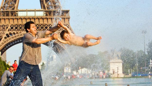 Playing in front of the Eiffel Tower (Credit: Credit: Look Die Bildagentur der Fotografen GmbH/Alamy) Playing in front of the Eiffel Tower (Credit: Credit: Look Die Bildagentur der Fotografen GmbH/Alamy)