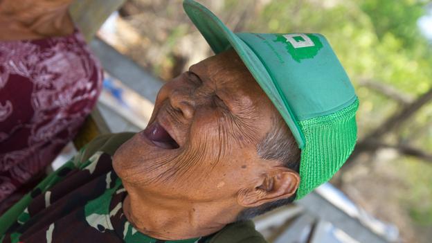 Despite hardships, Daeng Abu can often be seen in a joyous, toothless smile (Credit: Credit: Theodora Sutcliffe)