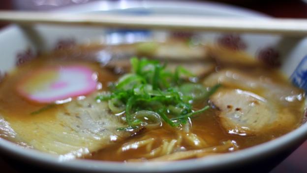 The ramen includes chashu, onion, a pink fish cake and bamboo shoots (Credit: Credit: Danielle Demetriou)