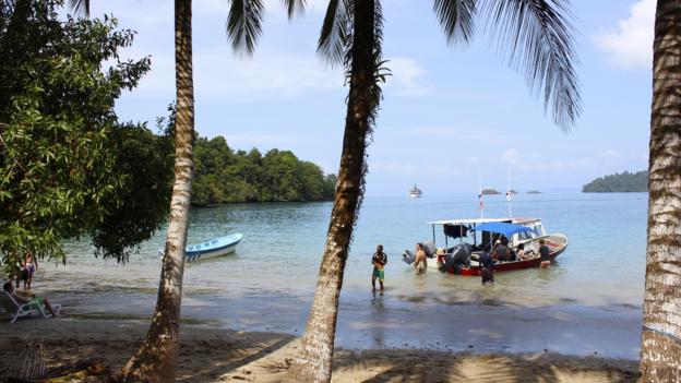 A dive boat arrives at the ranger station on Isla de Coiba (Credit: Credit: Sarah Shearman) A dive boat arrives at the ranger station on Isla de Coiba (Credit: Credit: Sarah Shearman)