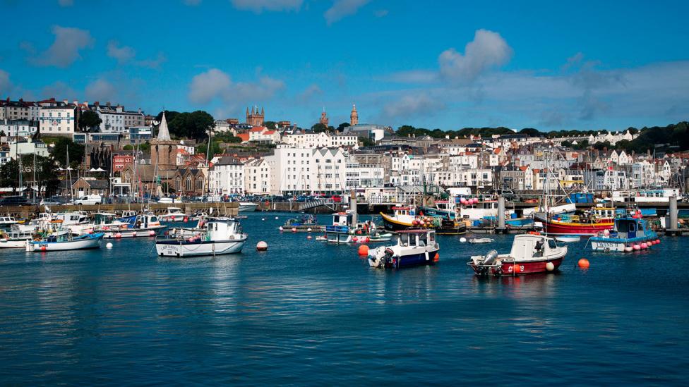 Fishing boats in Guernsey (Credit: Holger Leue/Getty)