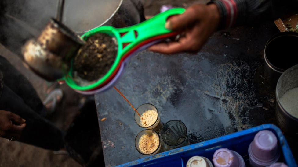 Pouring a cup of calming masala chai tea on India's chaotic streets (Credit: Credit: Rebecca Conway/Getty)