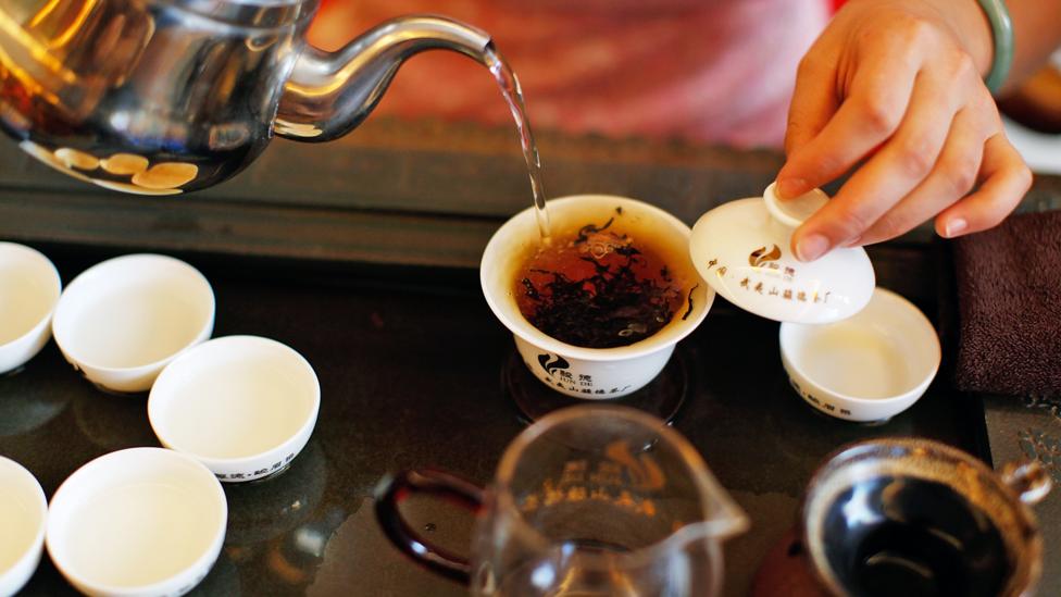 In China, drinking tea is considered an art form (Credit: Credit: Kevin Zen/Getty)