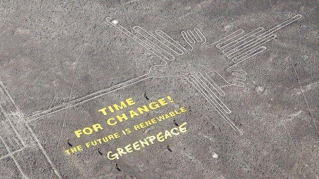 Activists apologise for any "moral offence" that Greenpeace has caused, after a publicity stunt on the ancient Nazca lines in Peru.