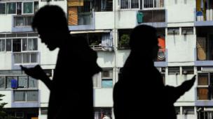 Silhoette of two men on phones (Copyright: Getty Images)