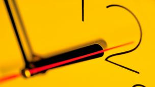 The mystery of the stopped clock illusion