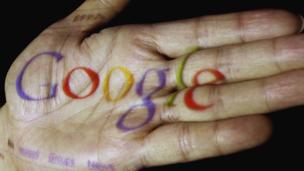 Google logo projected on to a hand (Copyright: Getty Images)