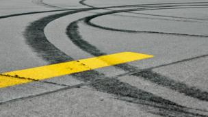 Skid marks on metalled road