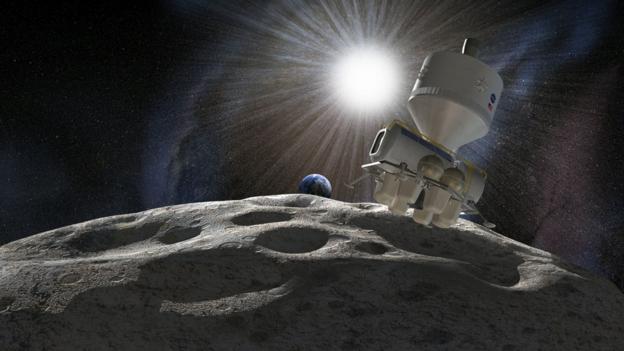 Artist's impression of a mission to an asteroid (Copyright: SPL)