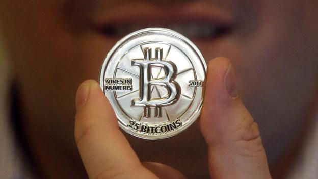 Bitcoin token held by its creator, software engineer Mike Caldwell (Copyright: AP)