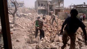 Photo supplied by Qusair Lens shows result of air strike in Qusair. 19 May 2013
