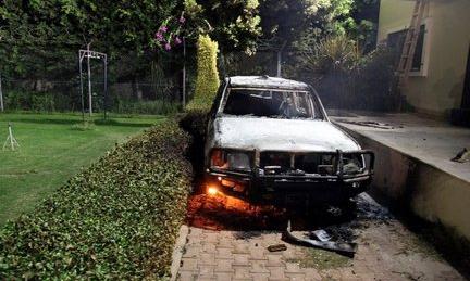 Burnt-out car inside US embassy compound - 11 September