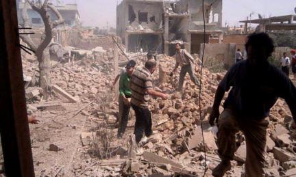 Photo supplied by Qusair Lens shows result of air strike in Qusair. 19 May 2013