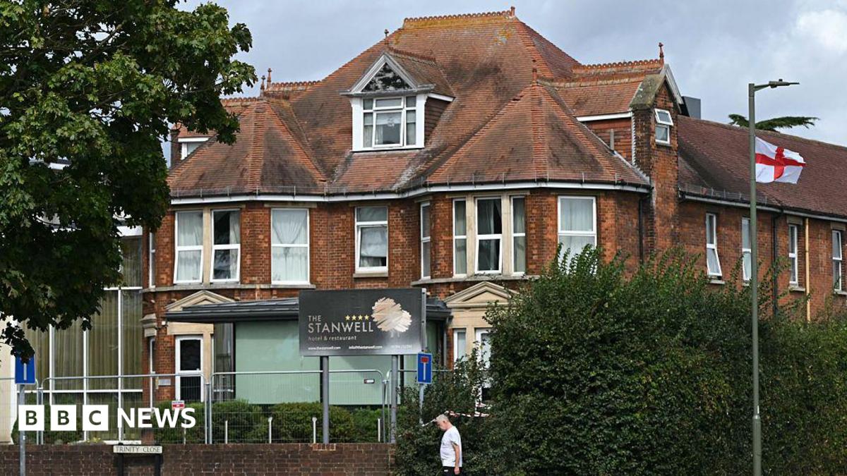 Man arrested on suspicion of attempted murder after incident at Surrey asylum hotel