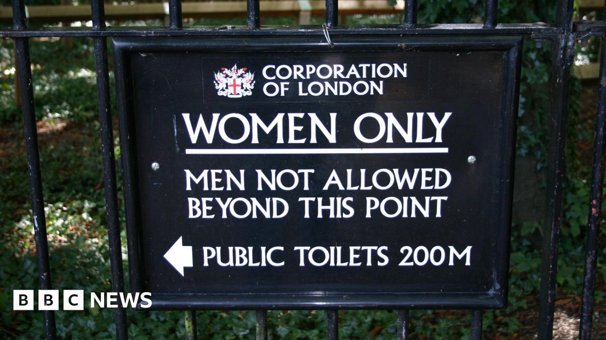 "Women only.  Men not allowed beyond this point" in white letters against a black backdrop