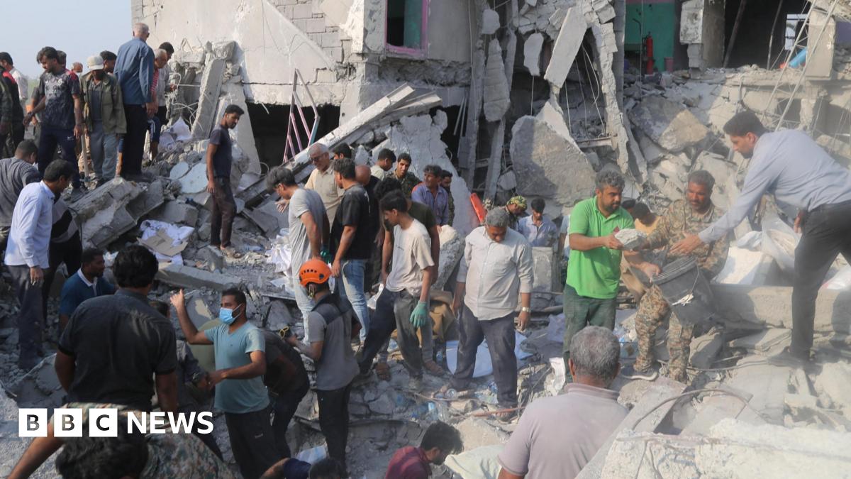 
                            At least 148 dead after reported strike on school, Iran says