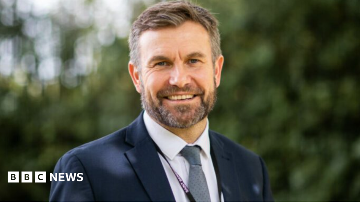 Boss of under-fire academy resigns after MPs' letter