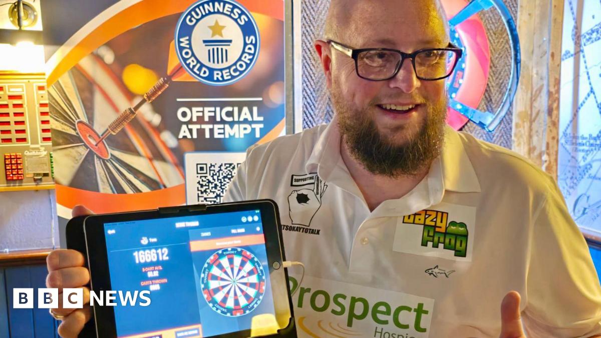 Wiltshire man finishes 12-hour darts world record attempt