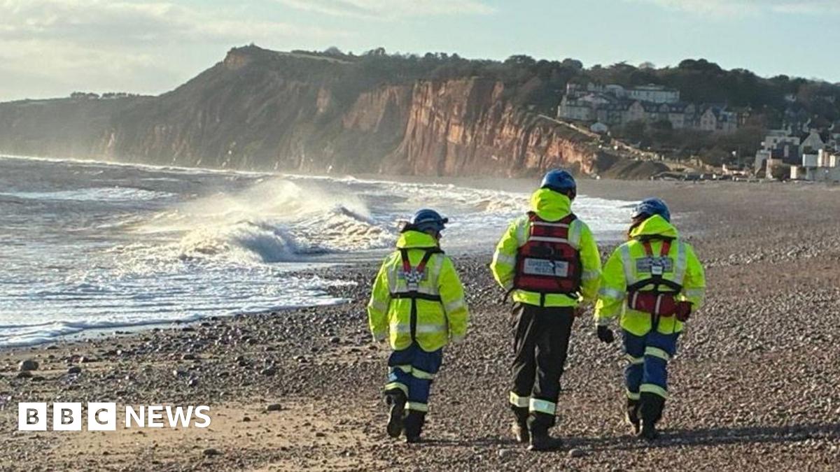 
                            Search for two men missing after Christmas Day swim called off