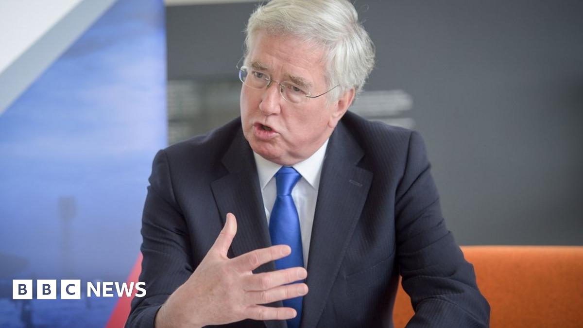 UK defence secretary threatens military strikes against hackers