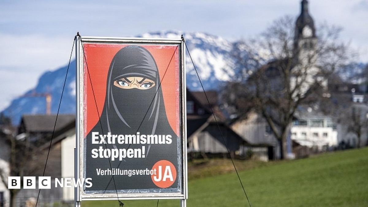 A poster promoting "Yes to the burka ban" is seen in Oberdorf, in the canton of Nidwalden, Switzerland, 16 February 2021
