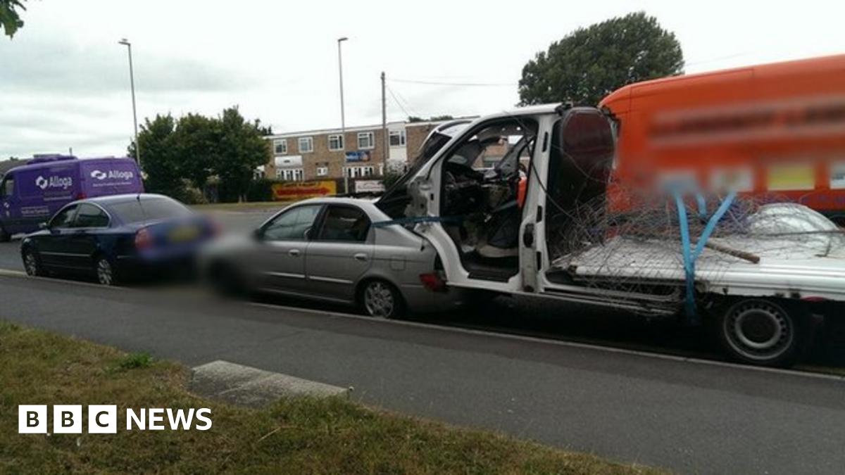 Gloucester driver caught towing van-strapped-in-car-boot