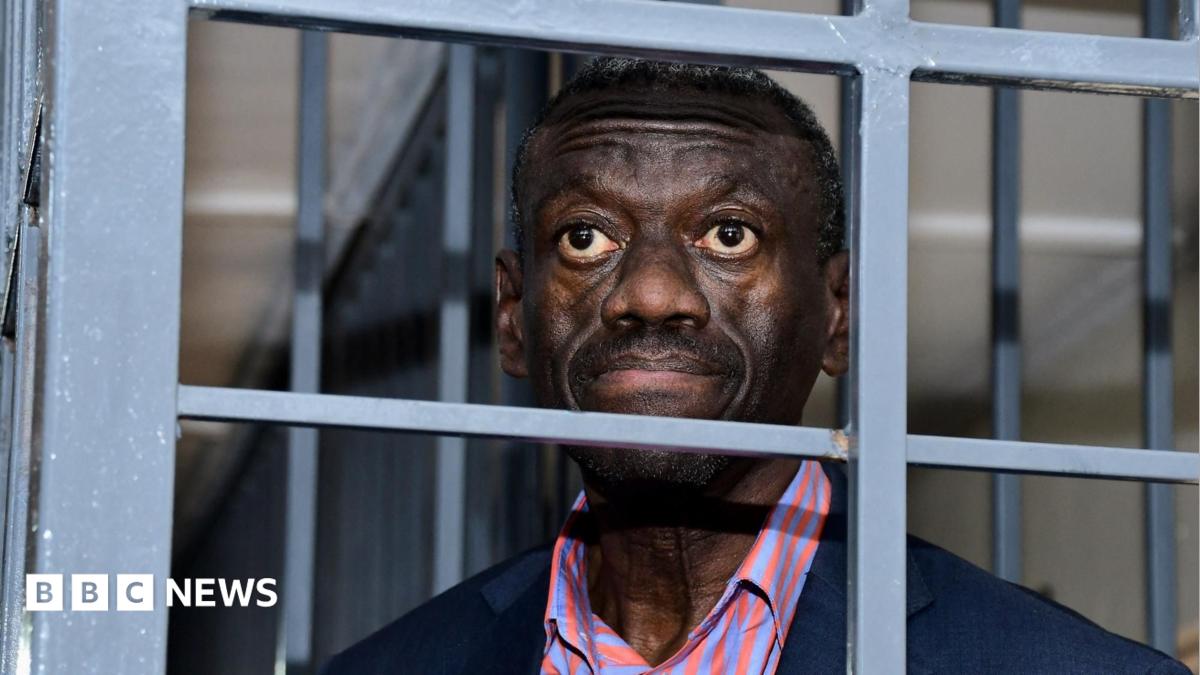 Veteran Ugandan opposition politician collapses in court and in ICU, his wife says