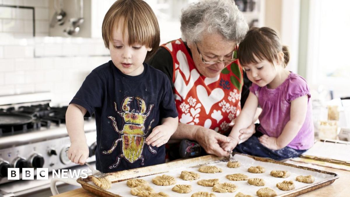Grandmother baking with grandchildren