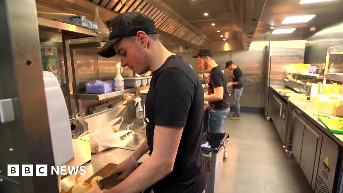 workers in a Deliveroo kitchen