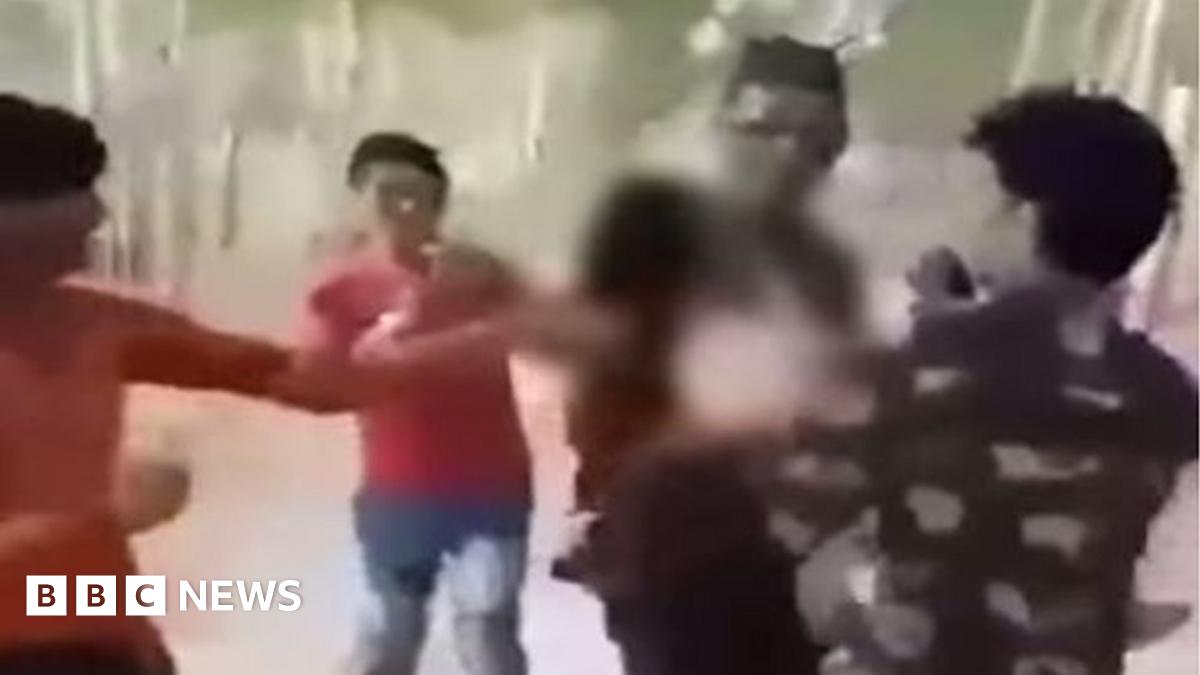 Three Indian men held over molestation viral video - BBC News