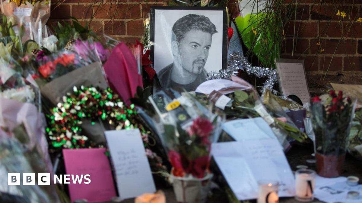 Flowers and tributes laid outside the Oxfordshire home of George Michael