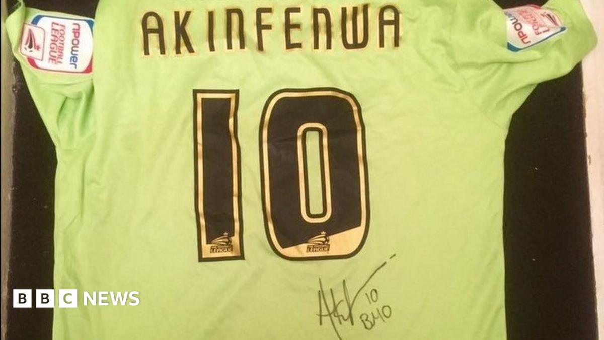 Adebayo Akinfenwa Shirt Too Big For Winning Bidder BBC News adebayo-akinfenwa-shirt-too-big-for-winning-bidder-bbc-news