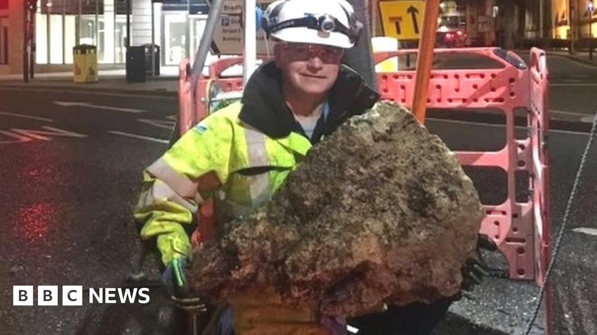 A mass of wet wipes being removed from a sewer