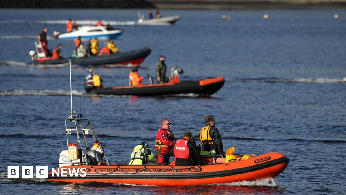 Boats herd whales from Gare Loch ahead of military exercise