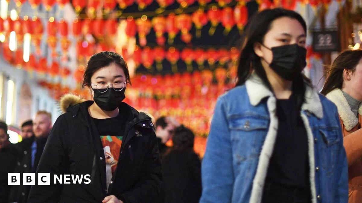 People wearing masks in Chinatown