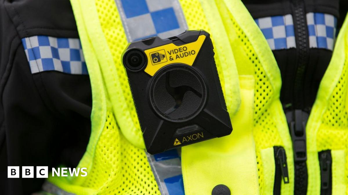 Police wearing body-worn camera - stock image