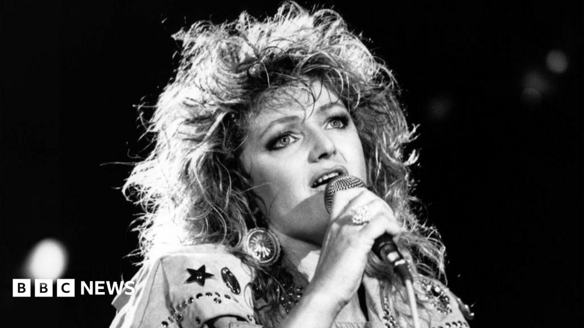 Bonnie Tyler fans line the streets as coffin taken to former home