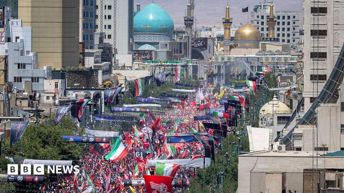 Huge crowds gather in Mashhad for burial of Iran's supreme leader