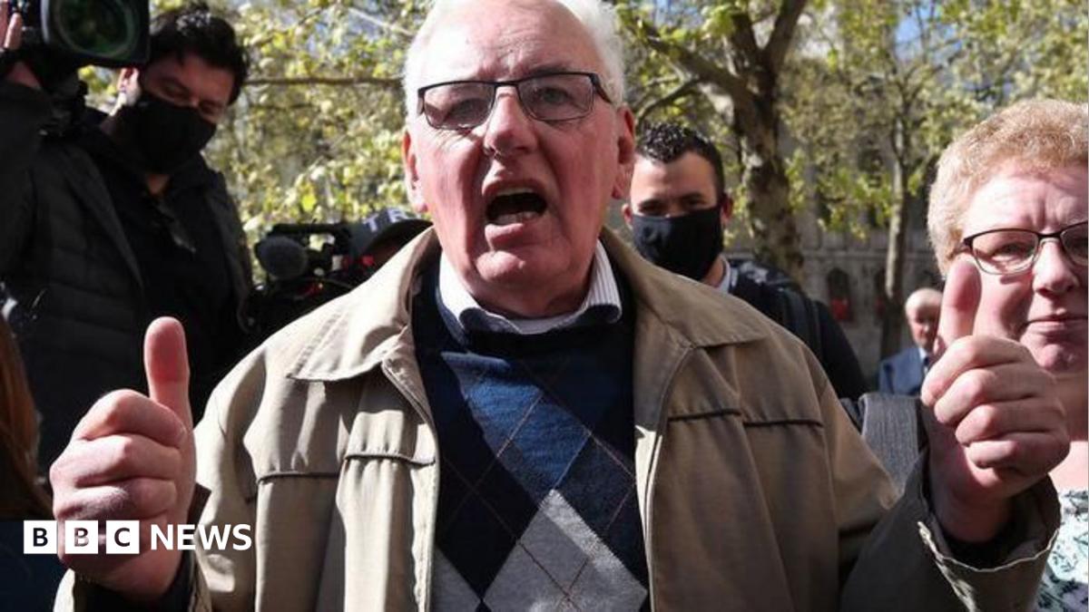 Former post office worker Noel Thomas, who was convicted of false accounting in 2006, celebrates with his daughter Sian outside the Royal Courts of Justice, London, after having his conviction overturned by the Court of Appeal