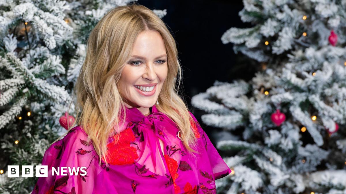 
                            Kylie leads three-way race for Christmas number one