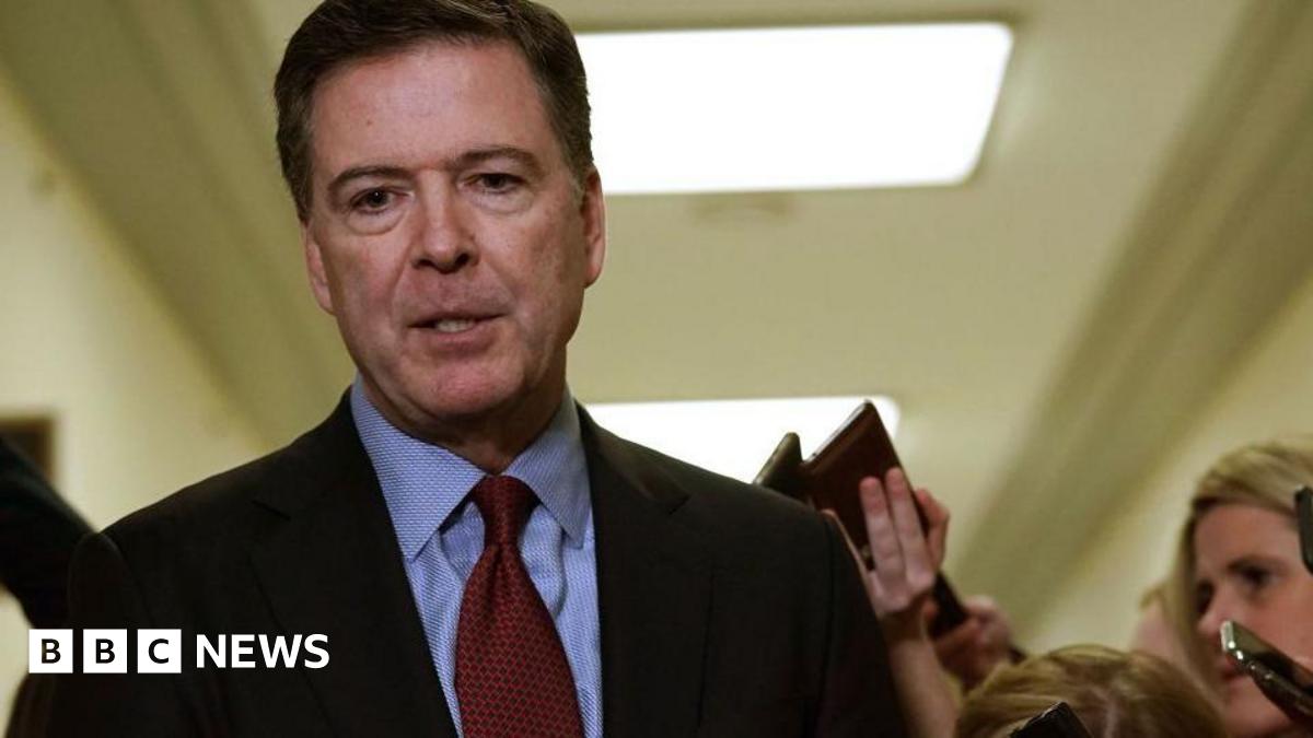 Former FBI director James Comey turns himself in to face charge that he threatened US President Donald Trump in Instagram post