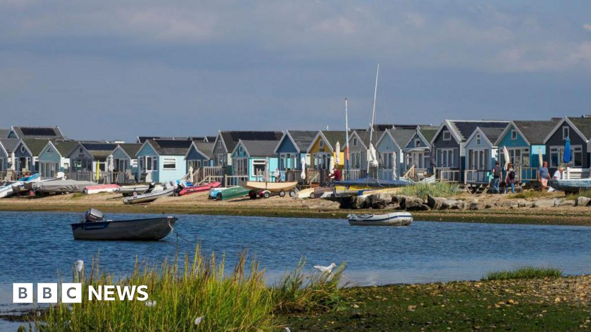 
                            Mudeford beach hut owners look into legality of council tax rise